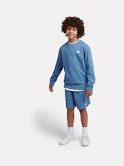 Bleu - New Balance Français Terry Shorts en coton à petit logo - Image 5 de 8