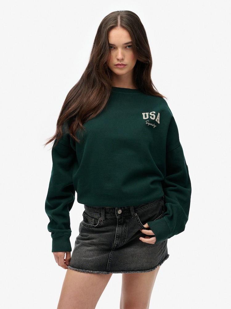 Superdry Green Athletic Essentials Relaxed Crew Neck Sweat top - Image 1 of 7 Superdry Green Athletic Essentials Relaxed Crew Neck Sweat top - Image 1 of 7