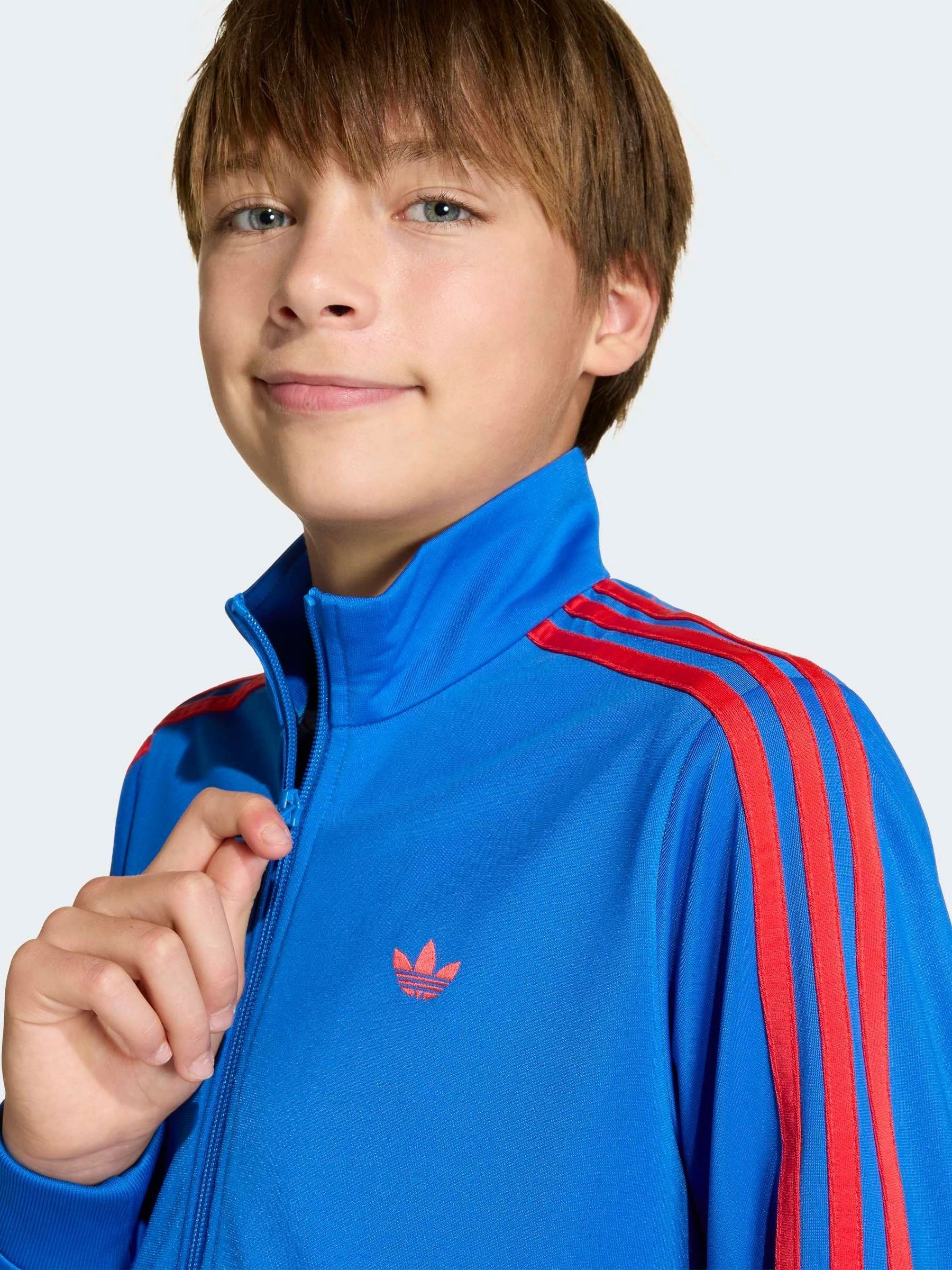 Buy adidas originals Blue Red Firebird Oversized Jacket from Next