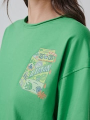 Grün - T-Shirt mit Rundhalsausschnitt und Grafik - Bild 5 von 9