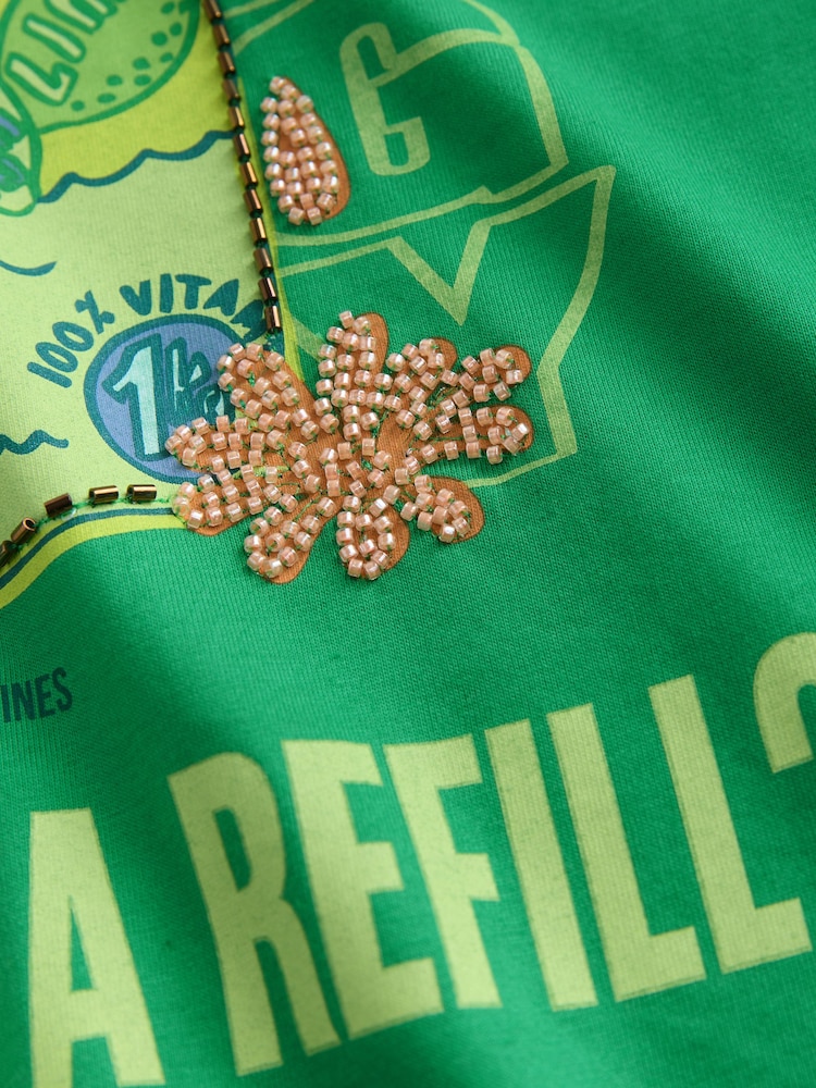 Grün - T-Shirt mit Rundhalsausschnitt und Grafik - Bild 9 von 9