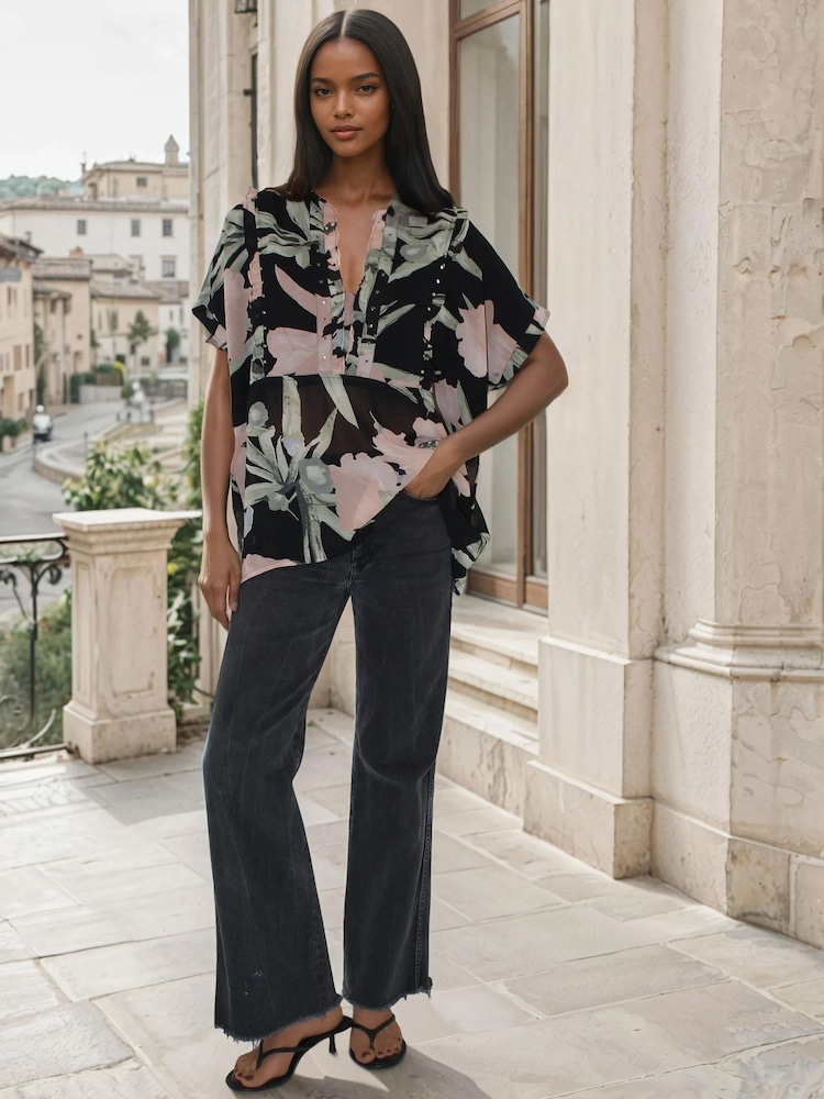 Religion Black Oversized Ivy Top In Soft Floral On Black Georgette With Stud Details - Image 1 of 5 Religion Black Oversized Ivy Top In Soft Floral On Black Georgette With Stud Details - Image 1 of 5