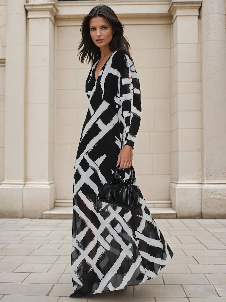 Religion Black Lily Column Bias Cut Maxi Dress In Abstract Monochrome Stripe Print - Image 1 of 4 Religion Black Lily Column Bias Cut Maxi Dress In Abstract Monochrome Stripe Print - Image 1 of 4