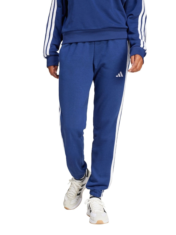 adidas Blue Essentials 3-Stripes French Terry Cuffed Joggers - Image 1 of 5 adidas Blue Essentials 3-Stripes French Terry Cuffed Joggers - Image 1 of 5