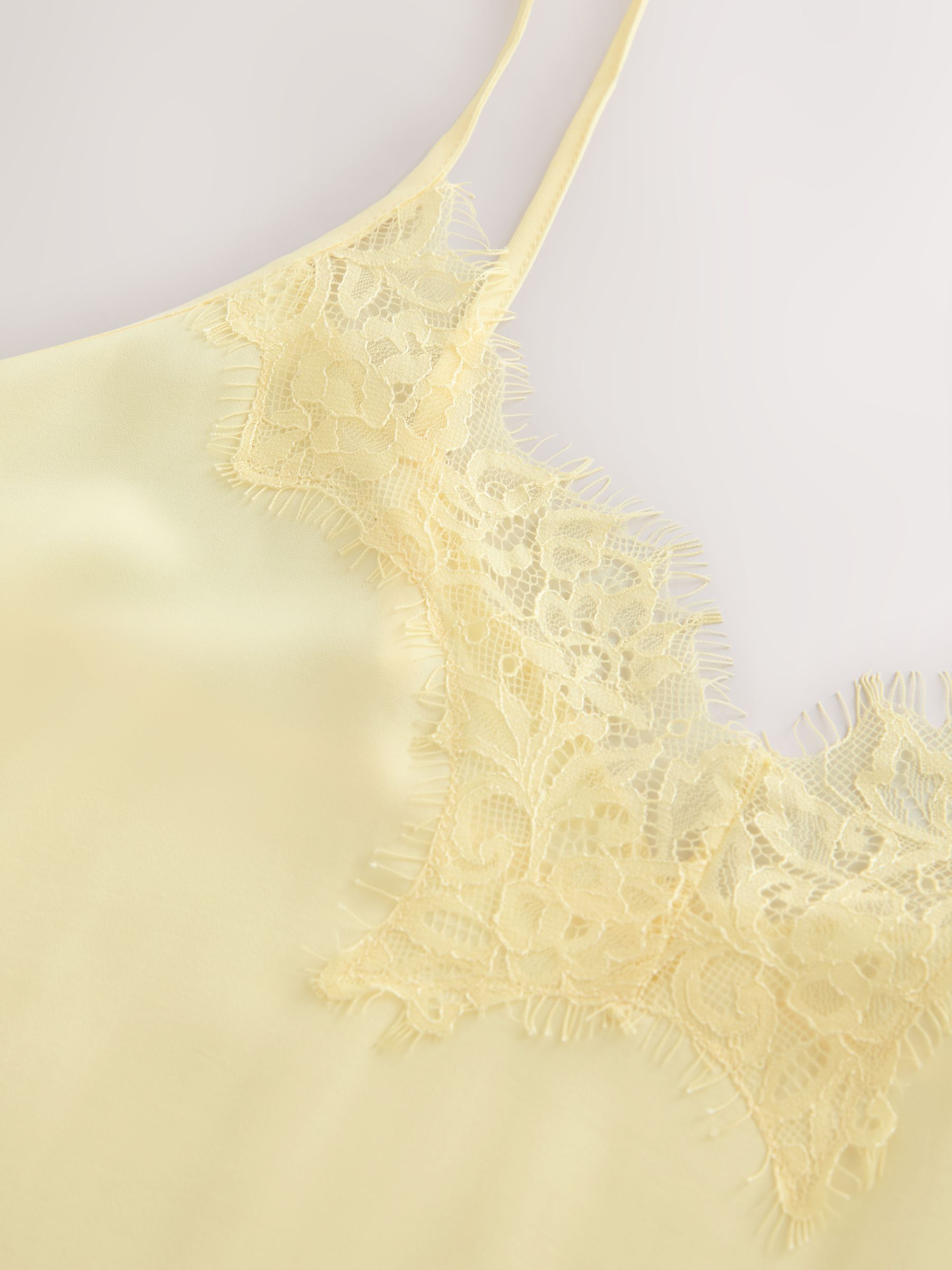 Buy Butter Yellow Lace Trim Satin Cami Top from the Next UK online