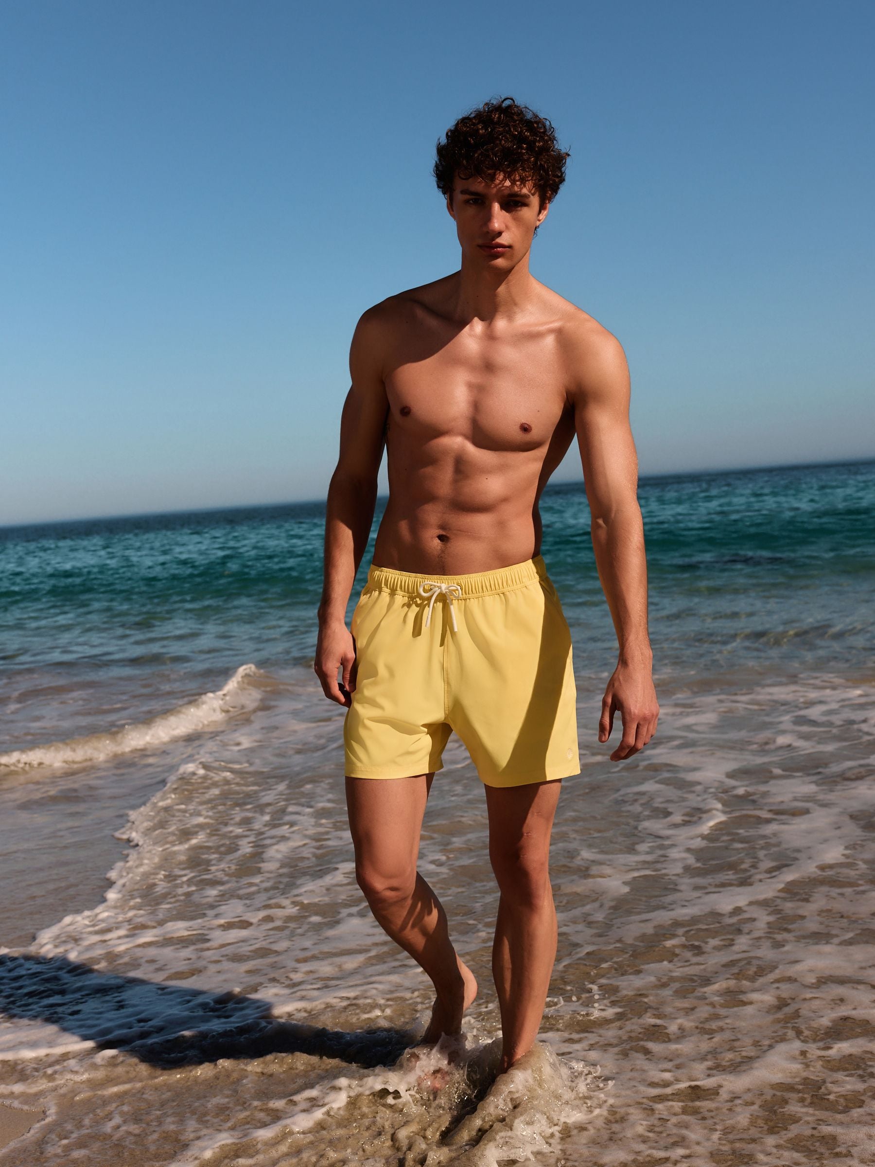 Buy Yellow Motion-Flex Swim Shorts from Next USA