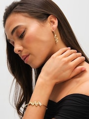 Inicio Gold Tone Snake Spiral Drop Hoop Earrings - Image 2 of 3