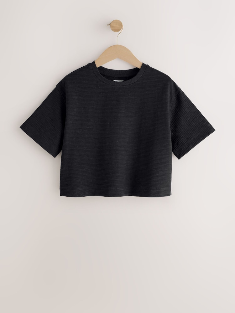 Schwarz - Textured Oversized Boxy T-Shirt (3-16yrs) - Bild 1 von 4