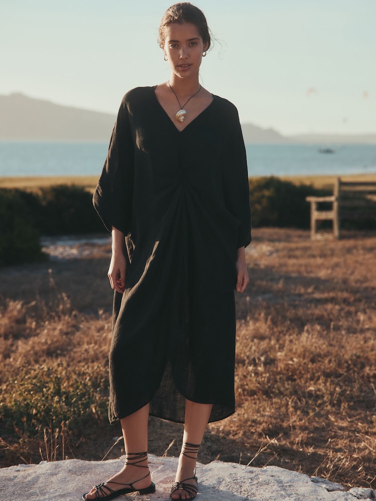 Schwarz - Twist Kleid - Bild 1 von 5 Schwarz - Twist Kleid - Bild 1 von 5