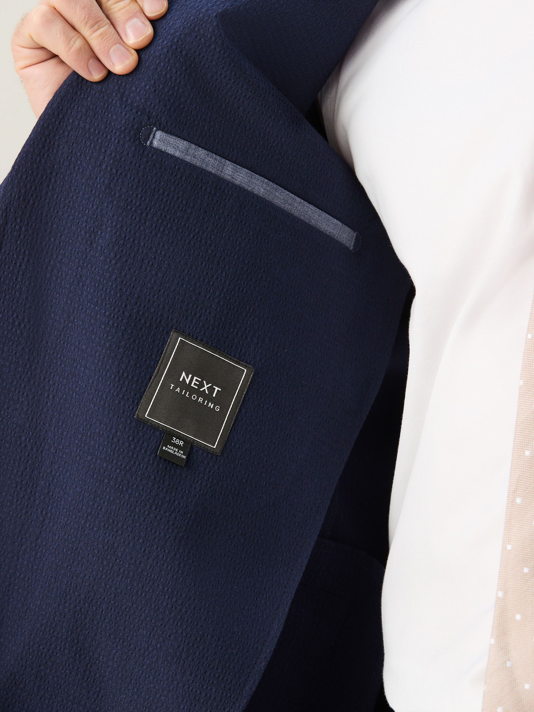Buy Navy Relaxed Fit Seersucker Texture Suit Jacket from Next USA