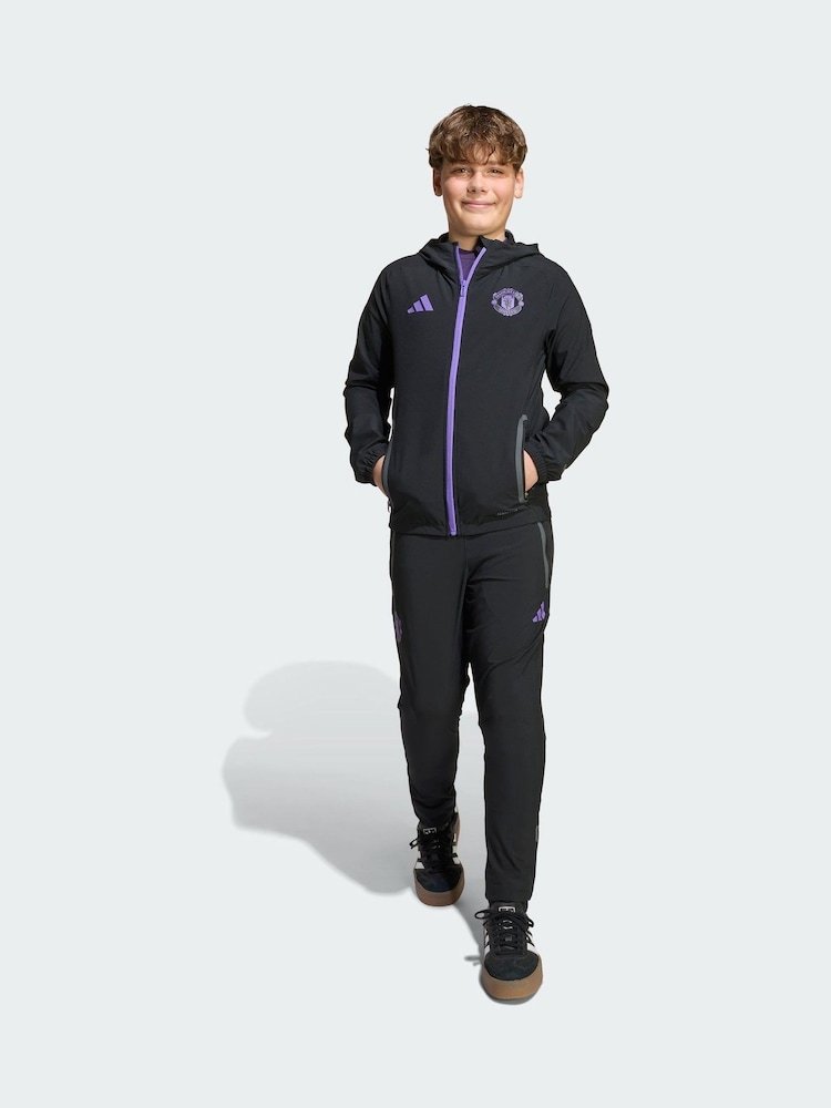 adidas Black Manchester United Trio 25 Competition Vis Tech Travel Trousers - Image 1 of 5