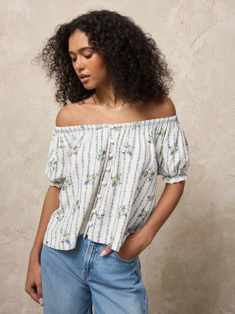 Ecru Floral Print Puff Sleeve Button Front Bardot Top With Linen - Image 1 of 8 Ecru Floral Print Puff Sleeve Button Front Bardot Top With Linen - Image 1 of 8