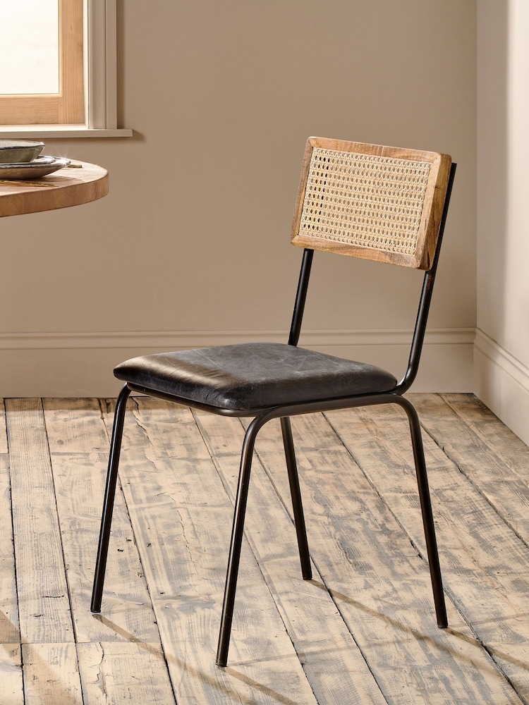 Nkuku Black Iswa Leather & Cane Dining Chair - Image 1 of 6 Nkuku Black Iswa Leather & Cane Dining Chair - Image 1 of 6