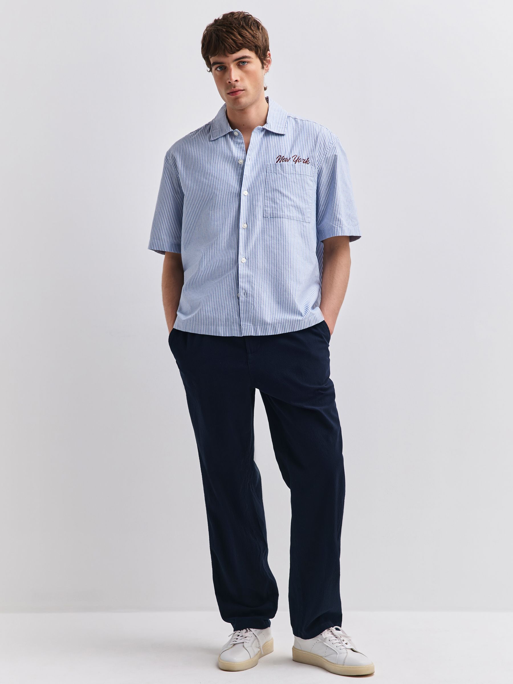 Buy Navy Blue Relaxed Tapered Fit Seersucker Trousers from Next USA