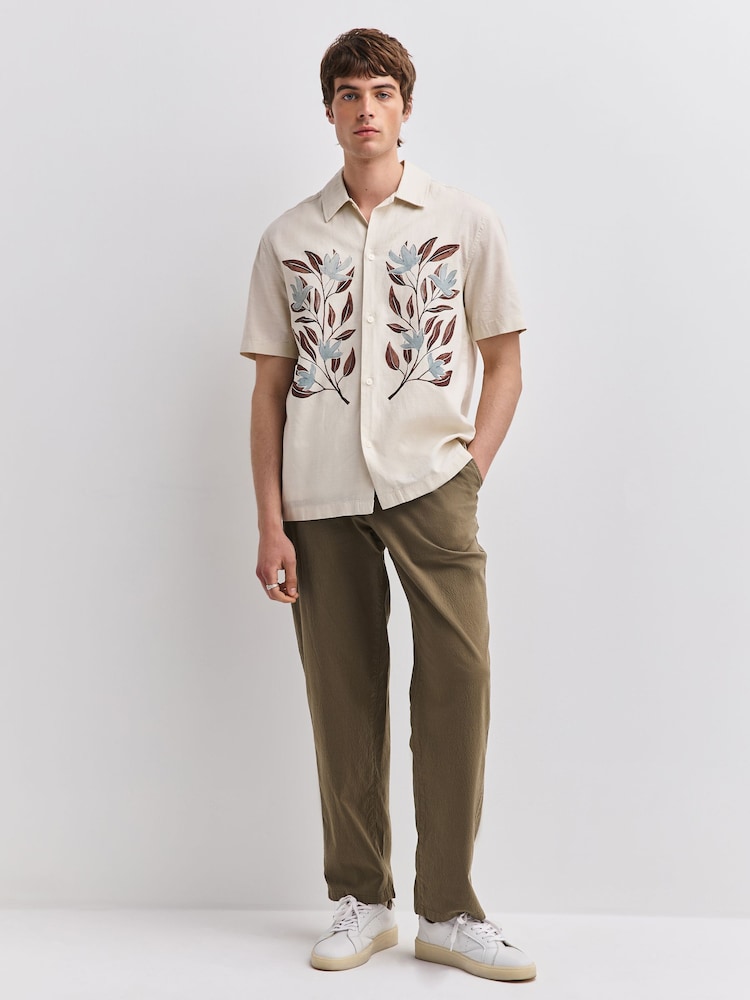 Khaki Green Relaxed Tapered Fit Cotton Rich Summerweight Seersucker Textured Trousers With Stretch - Image 1 of 4