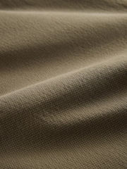 Khaki Green Relaxed Tapered Fit Cotton Rich Summerweight Seersucker Textured Trousers With Stretch - Image 7 of 9