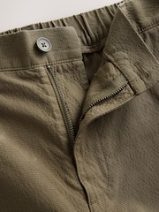 Khaki Green Relaxed Tapered Fit Cotton Rich Summerweight Seersucker Textured Trousers With Stretch - Image 8 of 9