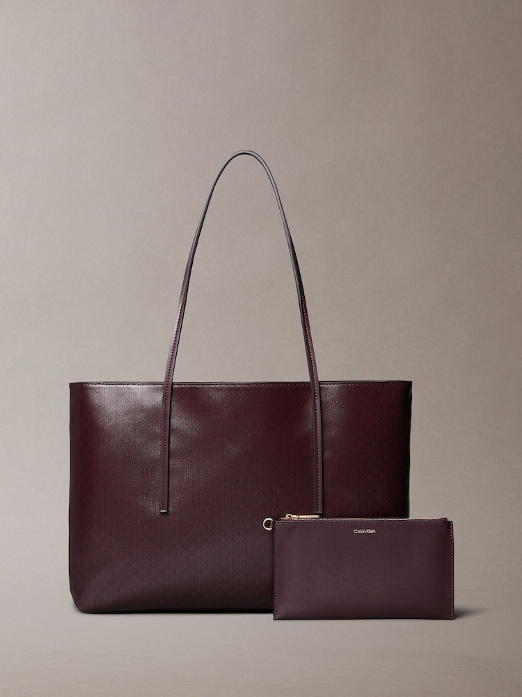 Calvin Klein Brown Allover Monogram Logo Tote Bag with Pouch - Image 1 of 3 Calvin Klein Brown Allover Monogram Logo Tote Bag with Pouch - Image 1 of 3