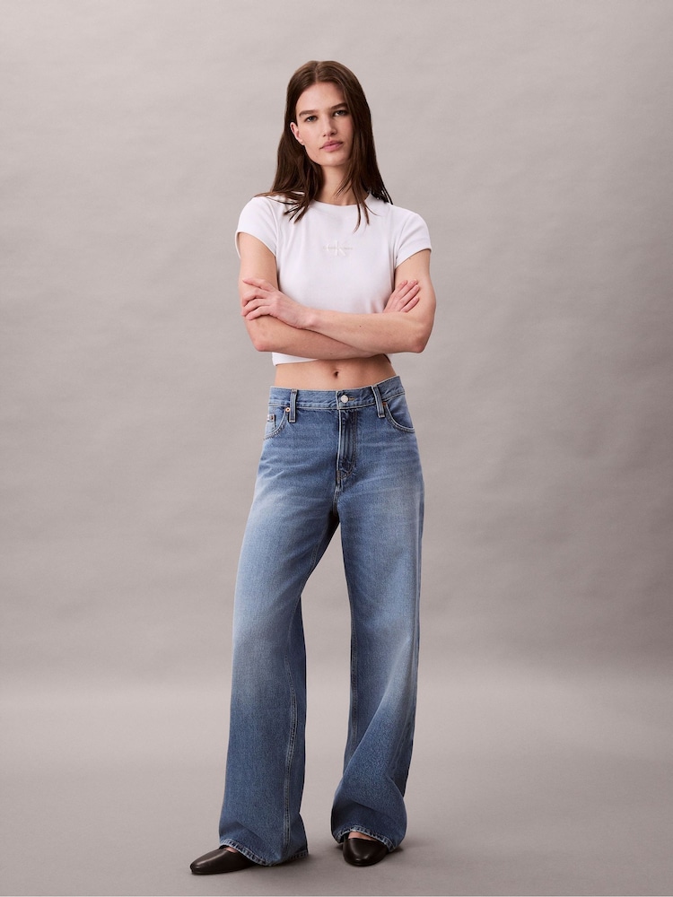 Calvin Klein Blue Low Rise Baggy Jeans - Image 1 of 7 Calvin Klein Blue Low Rise Baggy Jeans - Image 1 of 7