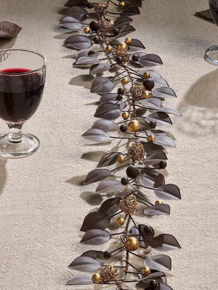 Nkuku Antique Brass Ishana Christmas Garland - Image 1 of 5 Nkuku Antique Brass Ishana Christmas Garland - Image 1 of 5