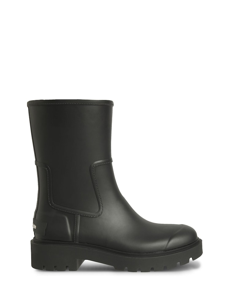 Calvin Klein Black Waterproof Flexible Lug Sole Rainboots - Image 1 of 6 Calvin Klein Black Waterproof Flexible Lug Sole Rainboots - Image 1 of 6