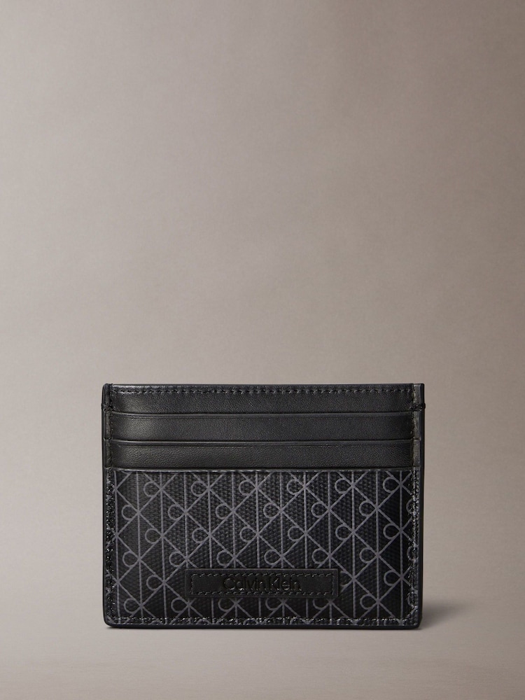 Calvin Klein Black Allover Monogram Logo Card Holder - Image 1 of 4 Calvin Klein Black Allover Monogram Logo Card Holder - Image 1 of 4