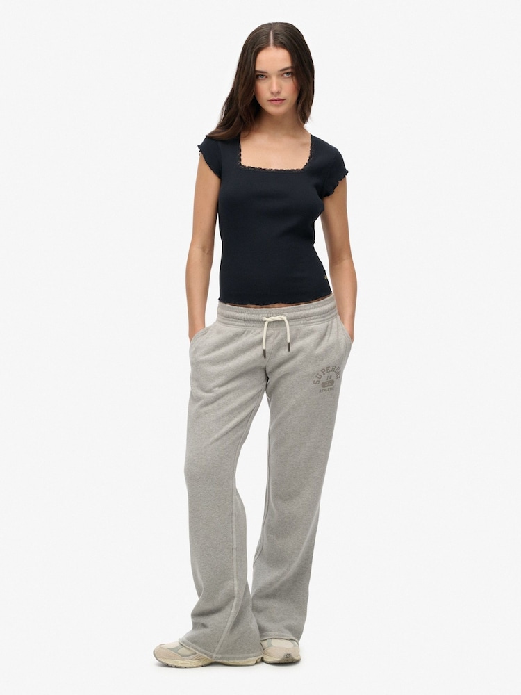 Superdry Grey Athletic Essentials Low Rise Flare Joggers - Image 1 of 8 Superdry Grey Athletic Essentials Low Rise Flare Joggers - Image 1 of 8