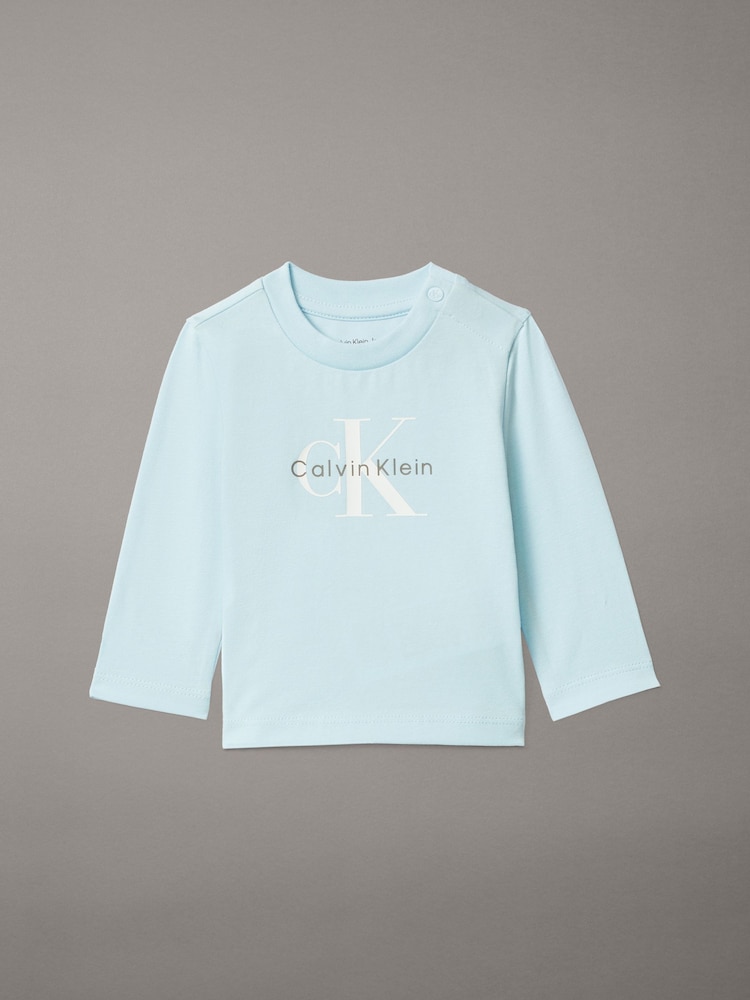 تيشِرت بكُم طويل للمواليد الجُدد من Calvin Klein - صورة 1 من 2 تيشِرت بكُم طويل للمواليد الجُدد من Calvin Klein - صورة 1 من 2