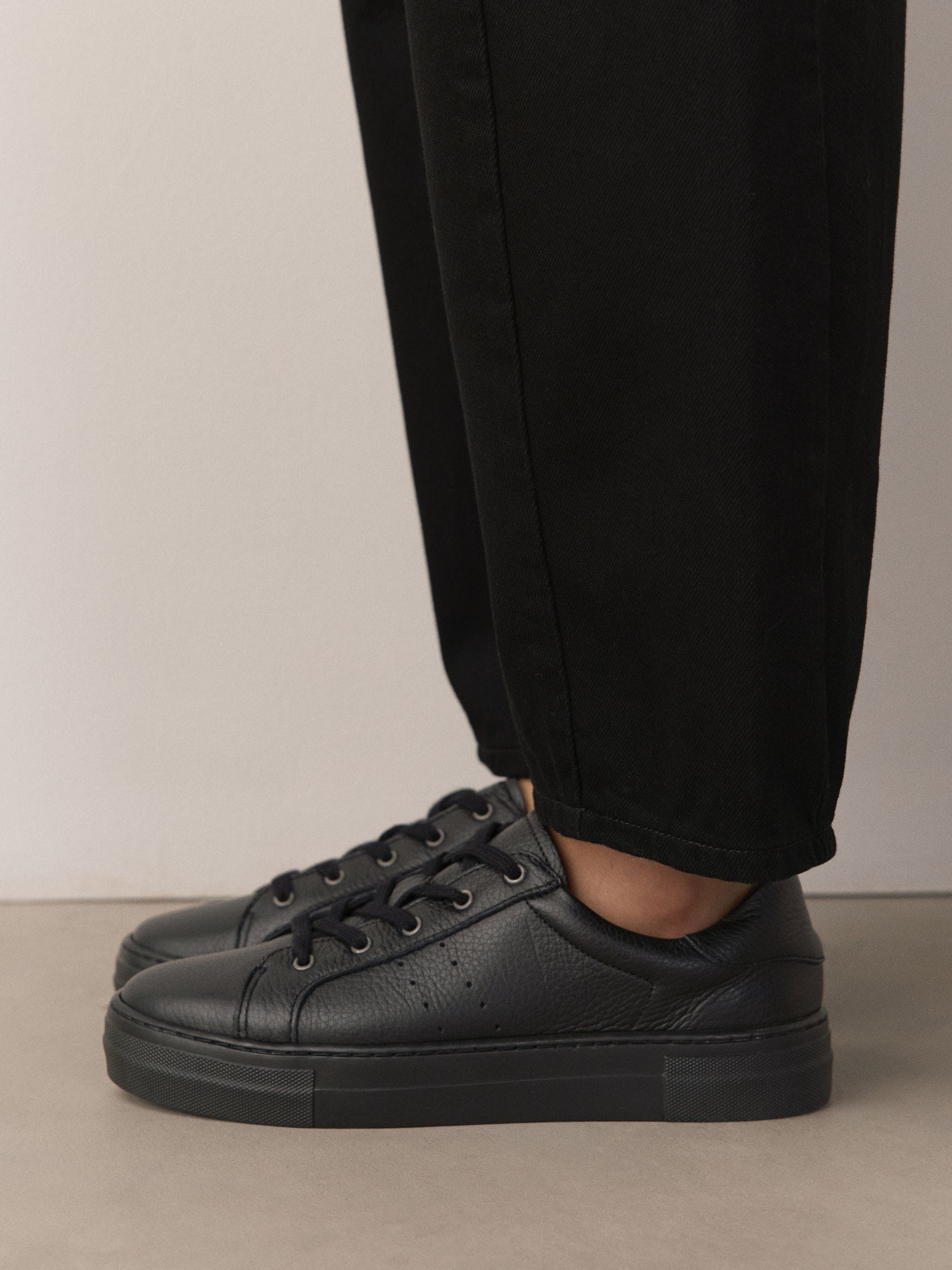 black leather lace up trainers