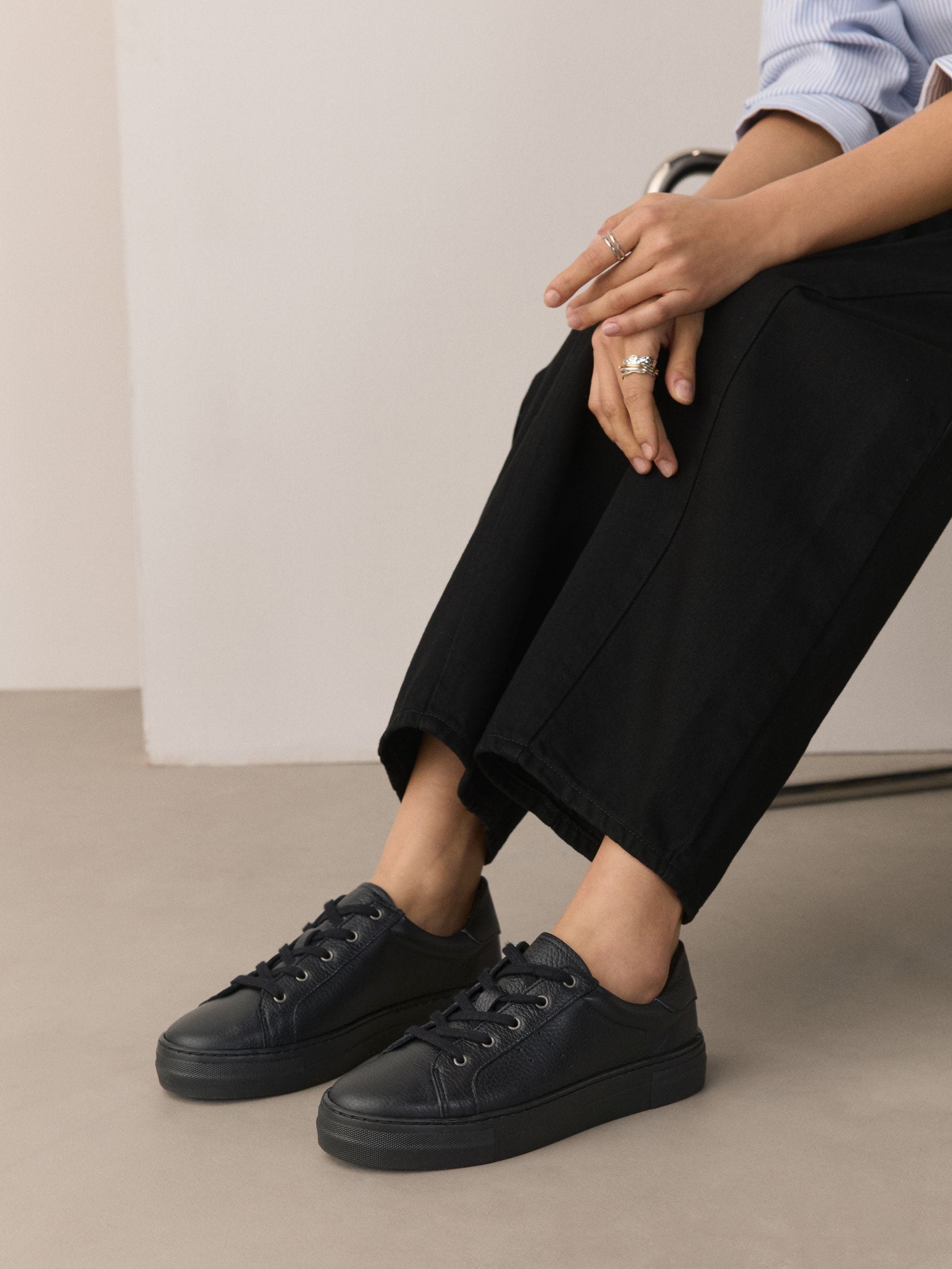 black leather lace up trainers