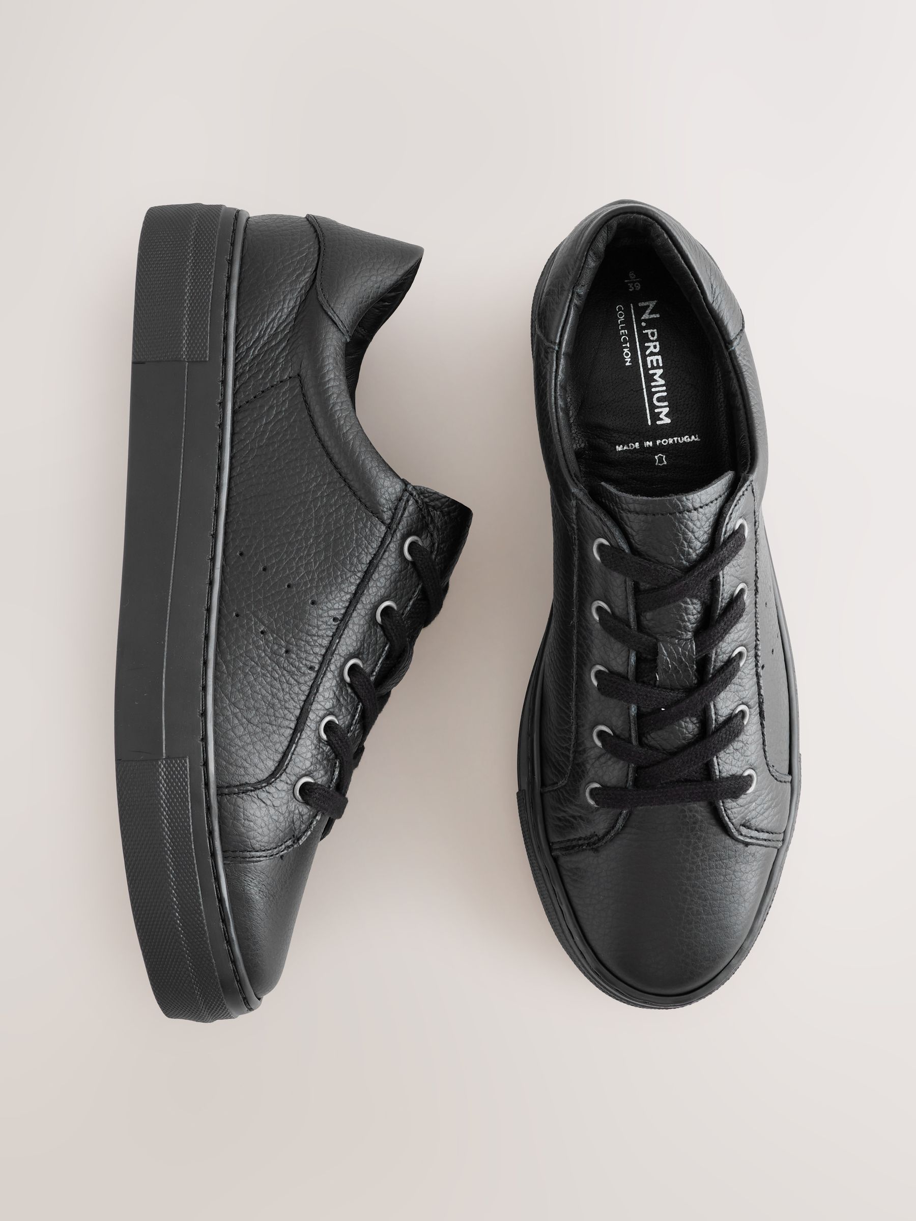 black leather lace up trainers
