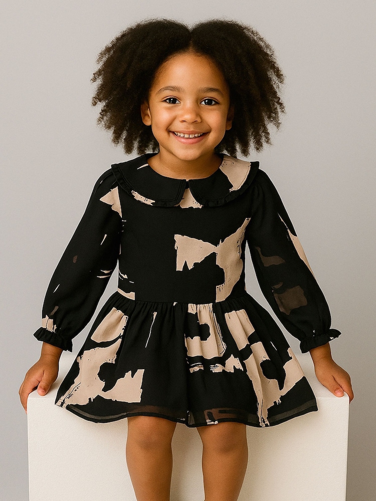 Religion Black Amelie Smock Dress With Pretty Frill Collar In Black And Soft Pink Abstract Print - Image 1 of 6 Religion Black Amelie Smock Dress With Pretty Frill Collar In Black And Soft Pink Abstract Print - Image 1 of 6