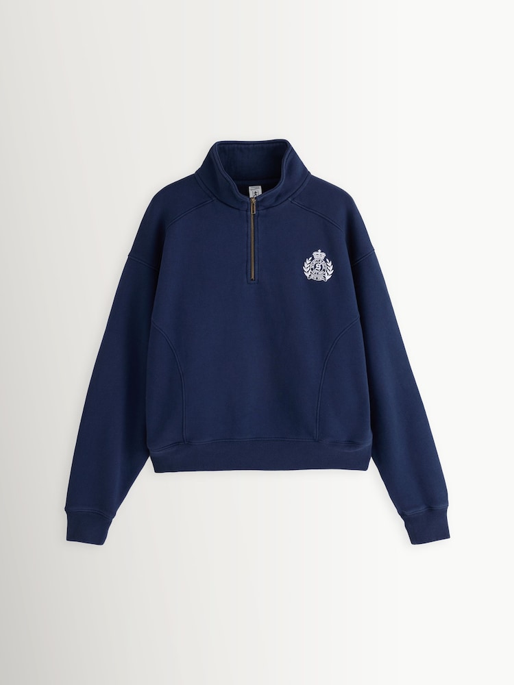 Sporty & Rich Blue NY Crest Embroidered Quarter Zip Sweat Top - Image 1 of 4 Sporty & Rich Blue NY Crest Embroidered Quarter Zip Sweat Top - Image 1 of 4