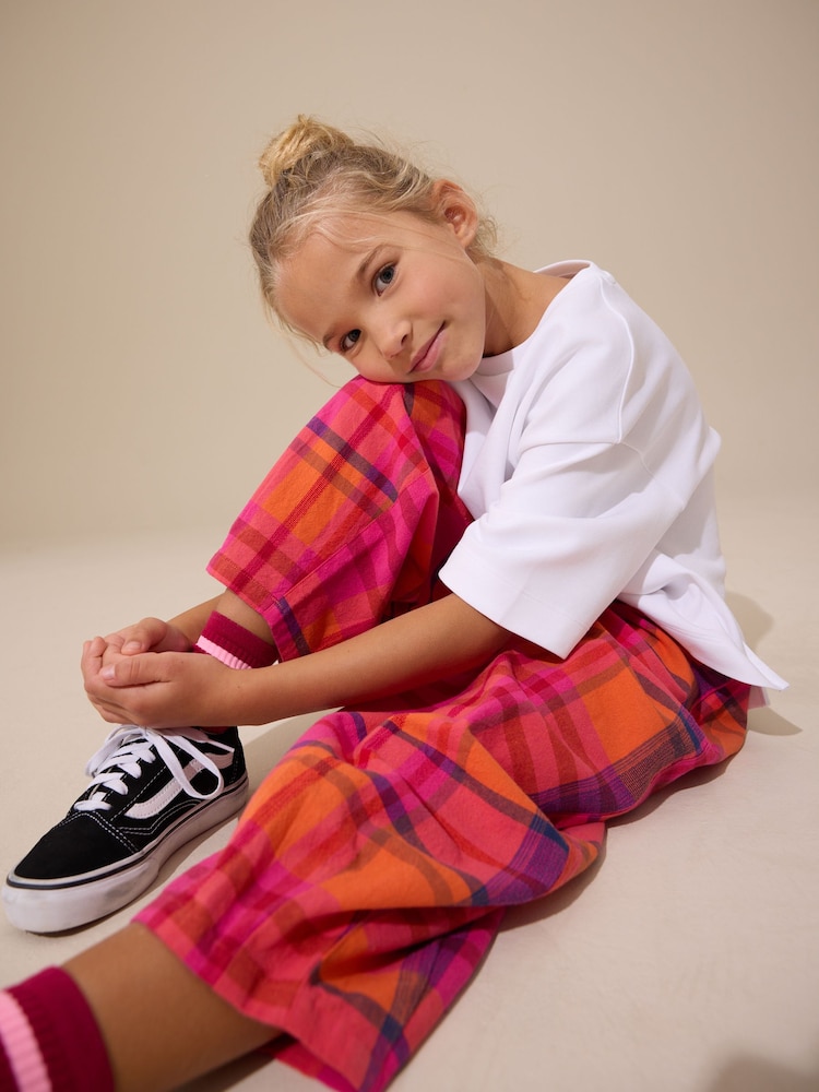 דוגמת משבצות בכמה צבעים - מכנסיים בגזרת חבית עם גומי במותן (גיל 3 עד 16) - תמונה 5 מתוך 5