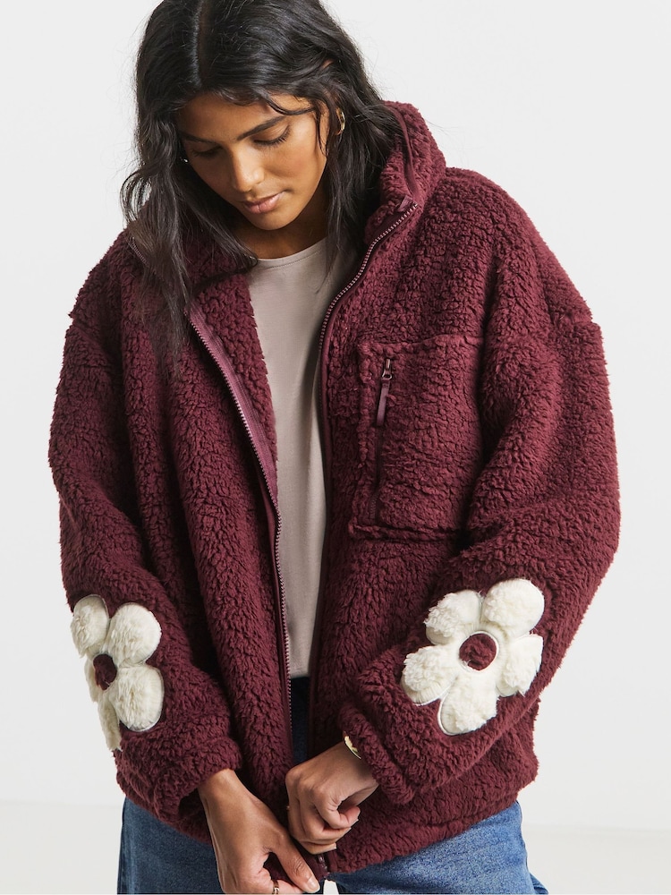 Simply Be Red Sherpa Teddy Fleece With Flower Sleeve Detail - Image 1 of 4 Simply Be Red Sherpa Teddy Fleece With Flower Sleeve Detail - Image 1 of 4