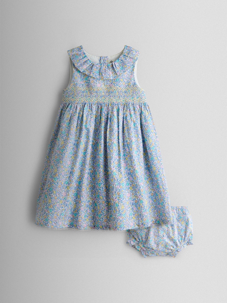 JoJo Maman Bébé Blue Floral Sleeveless Smocked Floral Dress - Image 1 of 7
