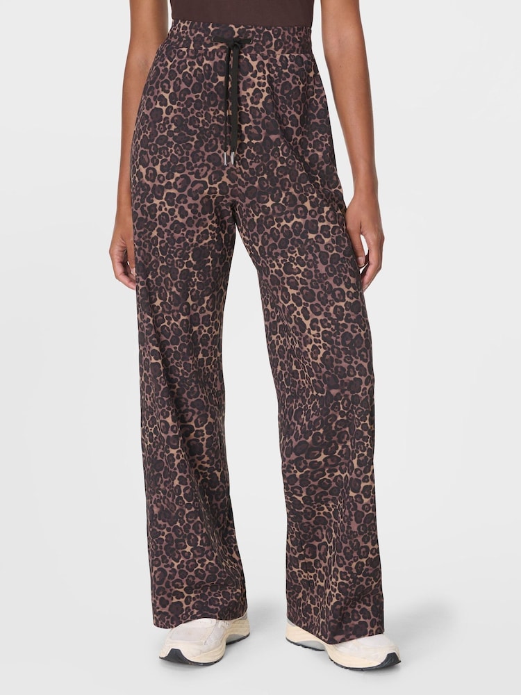 Sweaty Betty Brown 32 inch inside seam Explorer Wide Leg Taped 32" Trouser - Image 1 of 7 Sweaty Betty Brown 32 inch inside seam Explorer Wide Leg Taped 32" Trouser - Image 1 of 7