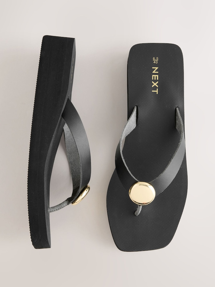 Black Hardware Trim Wedge Flip Flops - Image 1 of 7