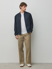 Akmens - Relaxed Fit - Kokvilnas bagātīgas, elastīgas chino bikses - Attēls 2 no 6
