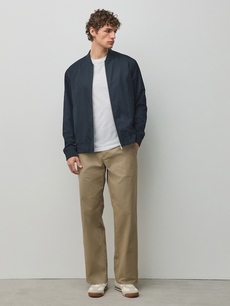 Akmens - Relaxed Fit - Kokvilnas bagātīgas, elastīgas chino bikses - Attēls 2 no 6
