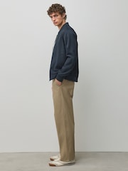 Akmens - Relaxed Fit - Kokvilnas bagātīgas, elastīgas chino bikses - Attēls 3 no 6