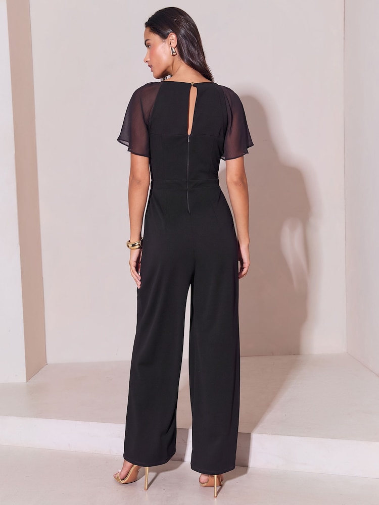 Lipsy Black Chiffon Flutter Sleeve Miltary Button Jumpsuit - Image 5 of 5 Lipsy Black Chiffon Flutter Sleeve Miltary Button Jumpsuit - Image 5 of 5