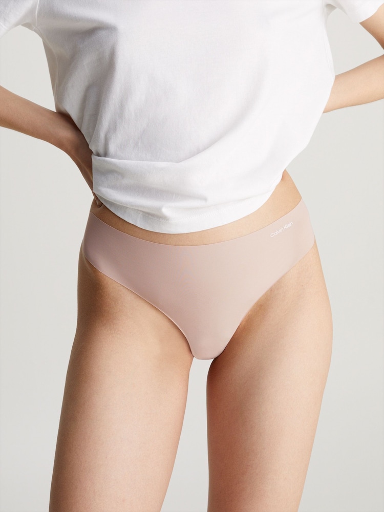 Calvin Klein Natural Thong Invisibles - Image 1 of 5 Calvin Klein Natural Thong Invisibles - Image 1 of 5
