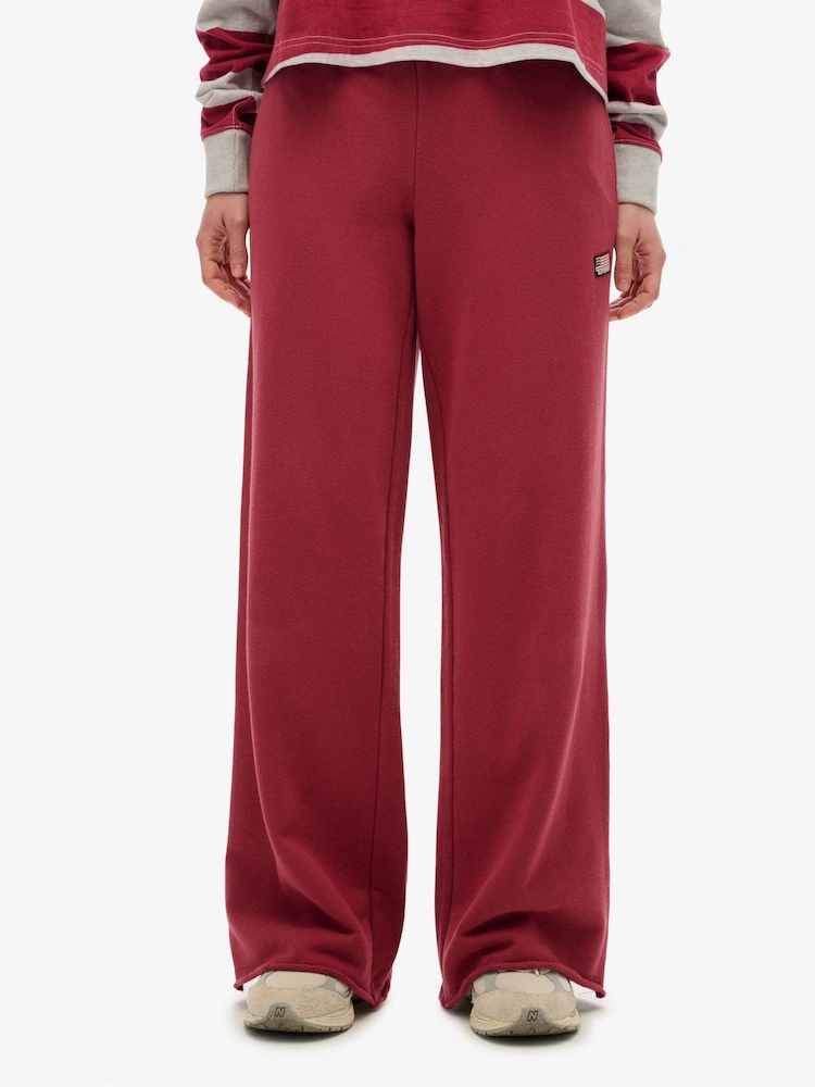Superdry Red Athletic Essentials Straight Leg Joggers - Image 1 of 4 Superdry Red Athletic Essentials Straight Leg Joggers - Image 1 of 4