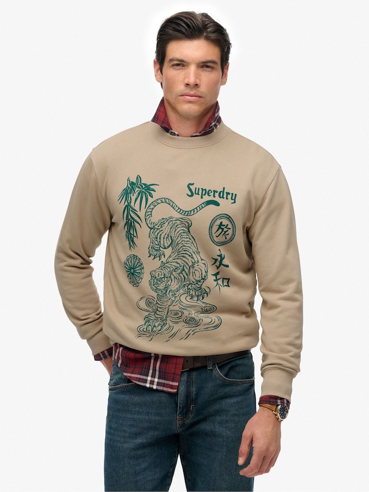 Superdry Brown Tokyo Narrative Loose Sweat Top - Image 1 of 7 Superdry Brown Tokyo Narrative Loose Sweat Top - Image 1 of 7