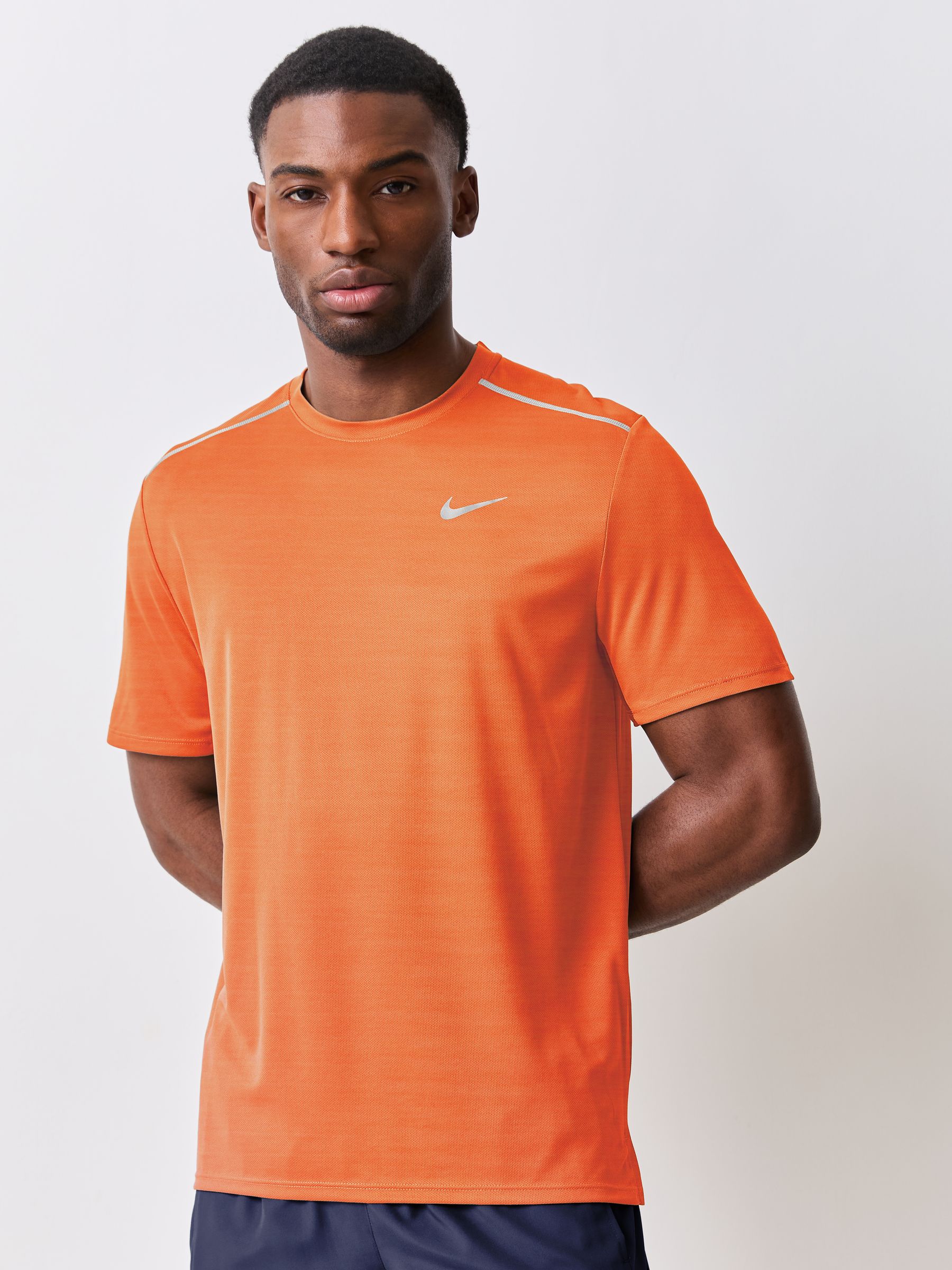 Buy Nike Safety Orange Miler Dri-FIT UV Running T-Shirt from Next