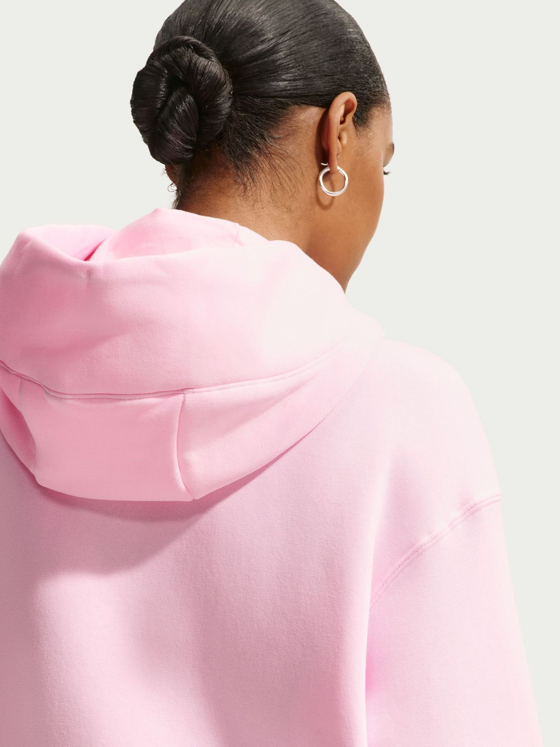 Next：日本 ピンクフォーム - Nike Phoenix オーバーサイズ フリース