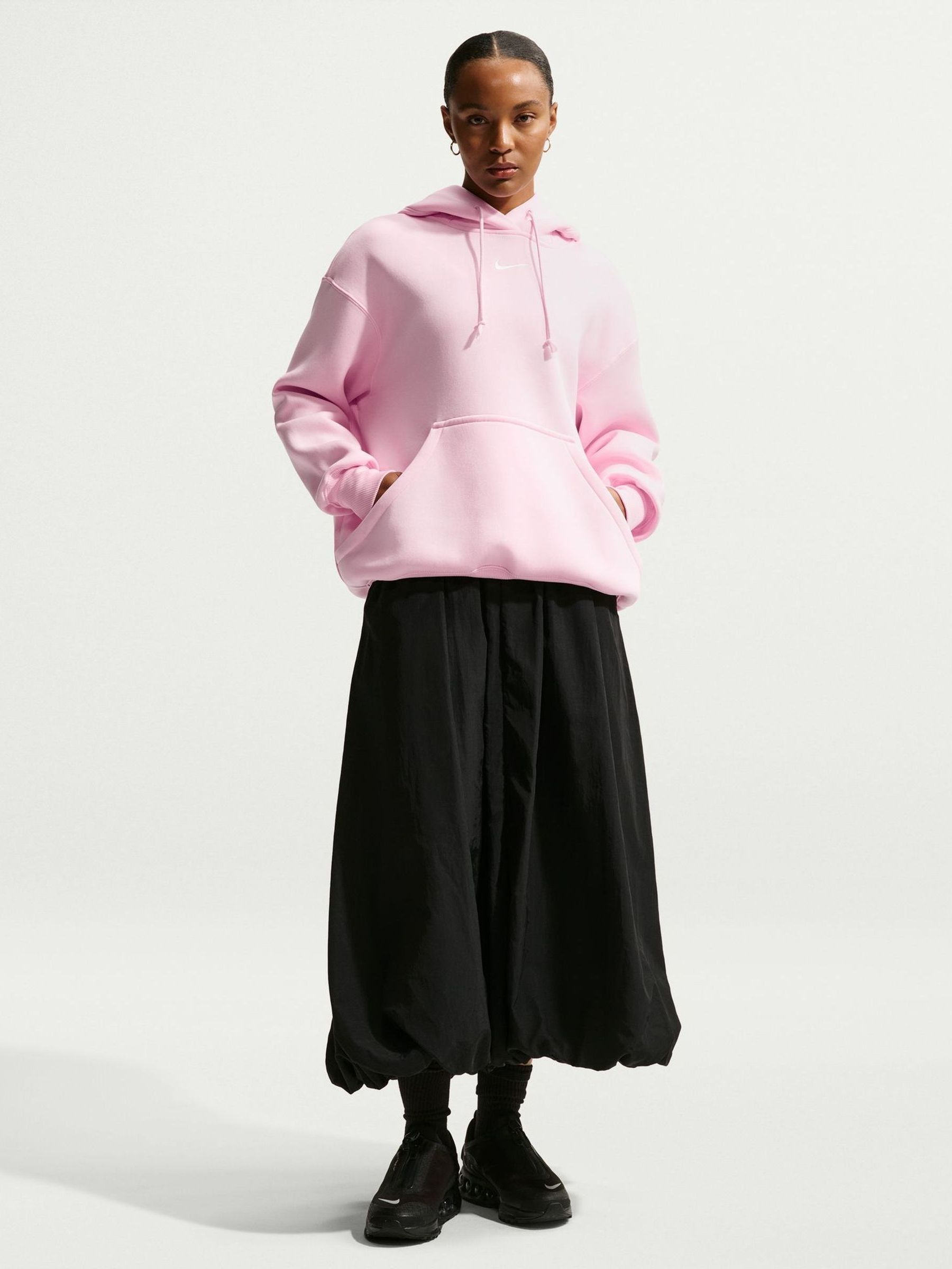Next：日本 ピンクフォーム - Nike Phoenix オーバーサイズ フリース
