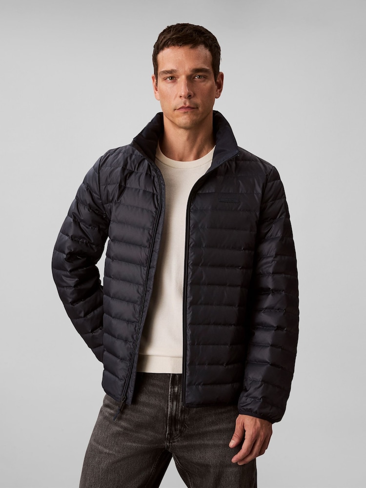 Calvin Klein Blue Lightweight Puffer Jacket - Image 1 of 6 Calvin Klein Blue Lightweight Puffer Jacket - Image 1 of 6