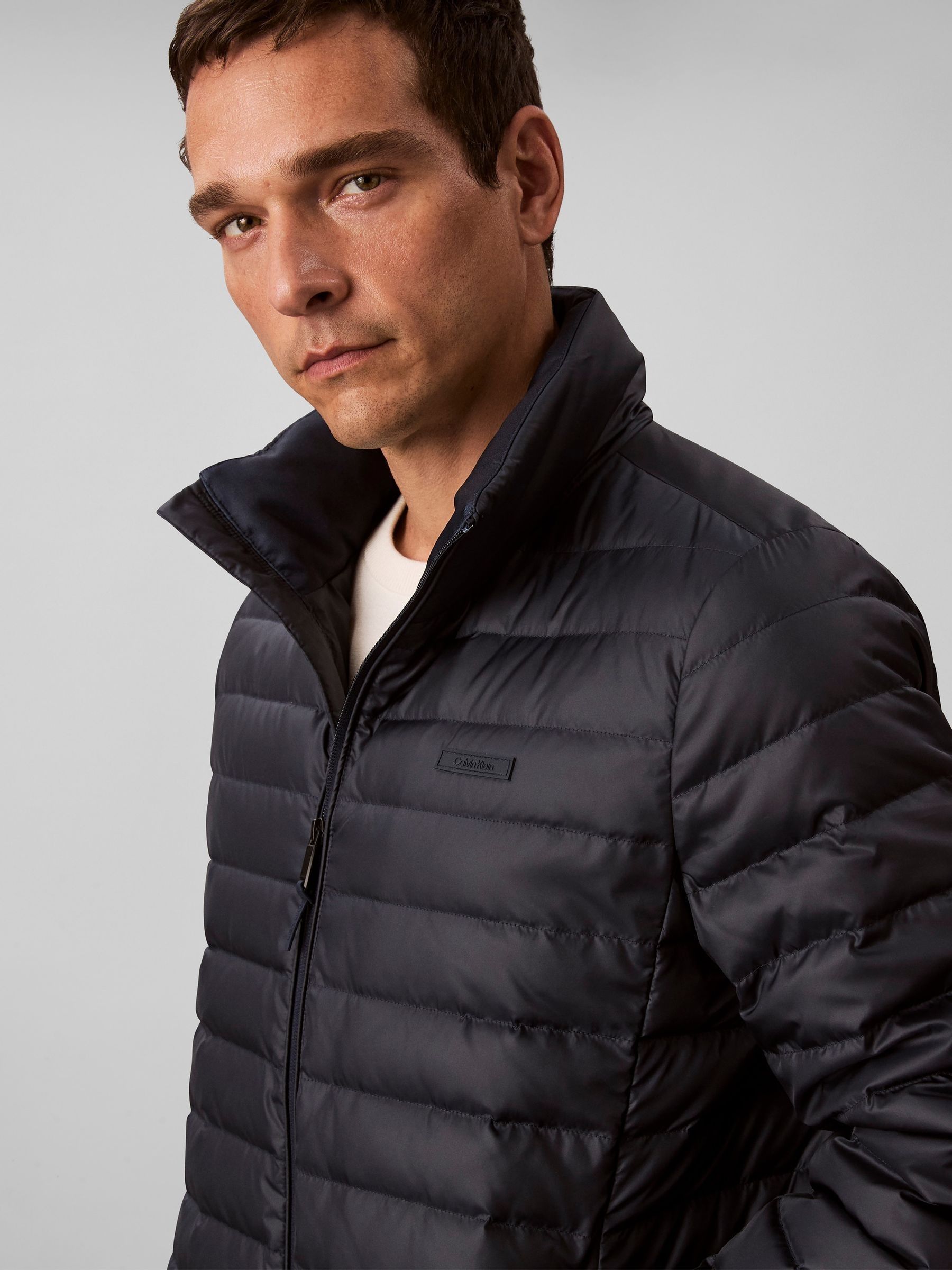 Buy Calvin Klein Blue Lightweight Puffer Jacket from Next USA